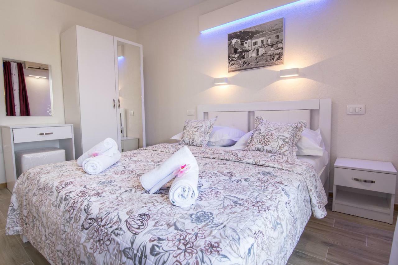 Apartments Family Roso Проманья Экстерьер фото